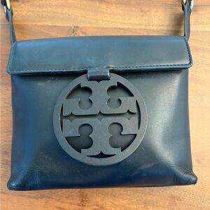 Tory Burch Black Leather Crossbody Bag
5” at top of strap are slightly frayed.
